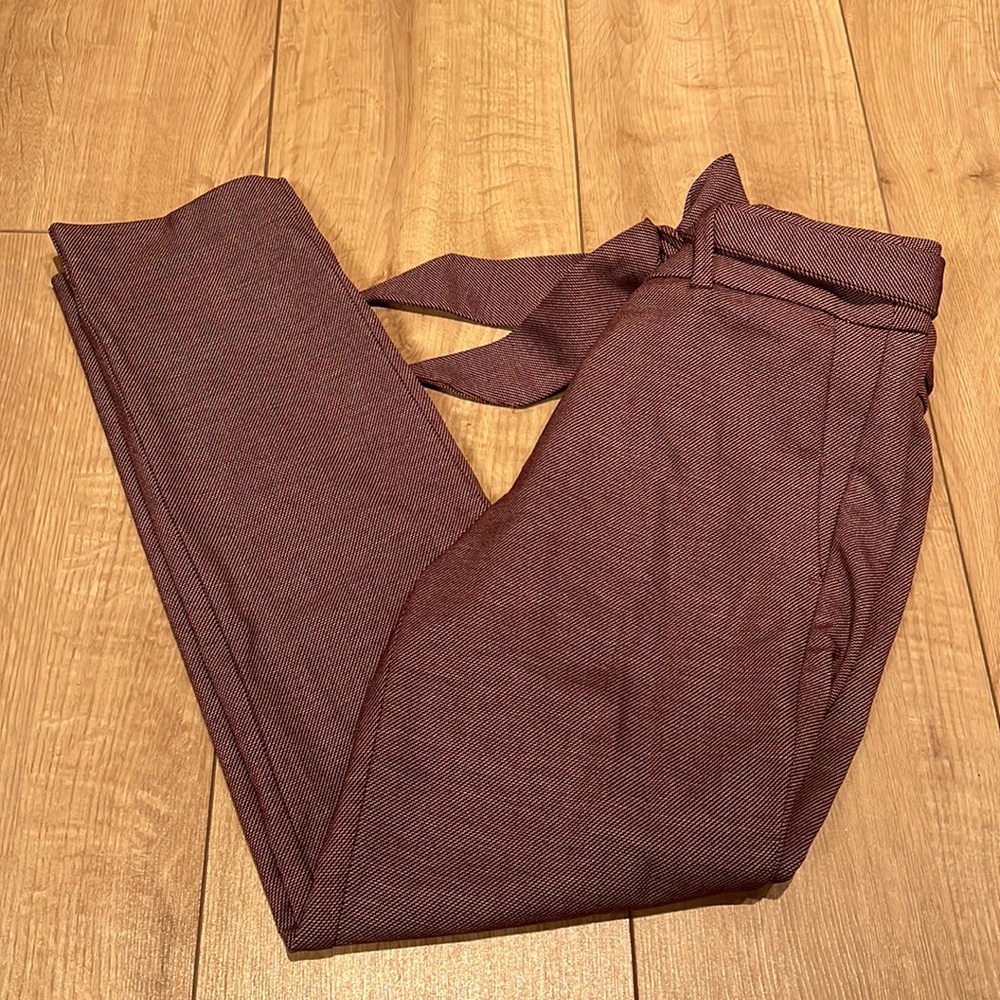 Purple pants with a tie belt